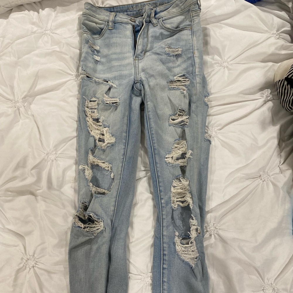 Light blue American eagle stretchy skinny jeans, gently worn
